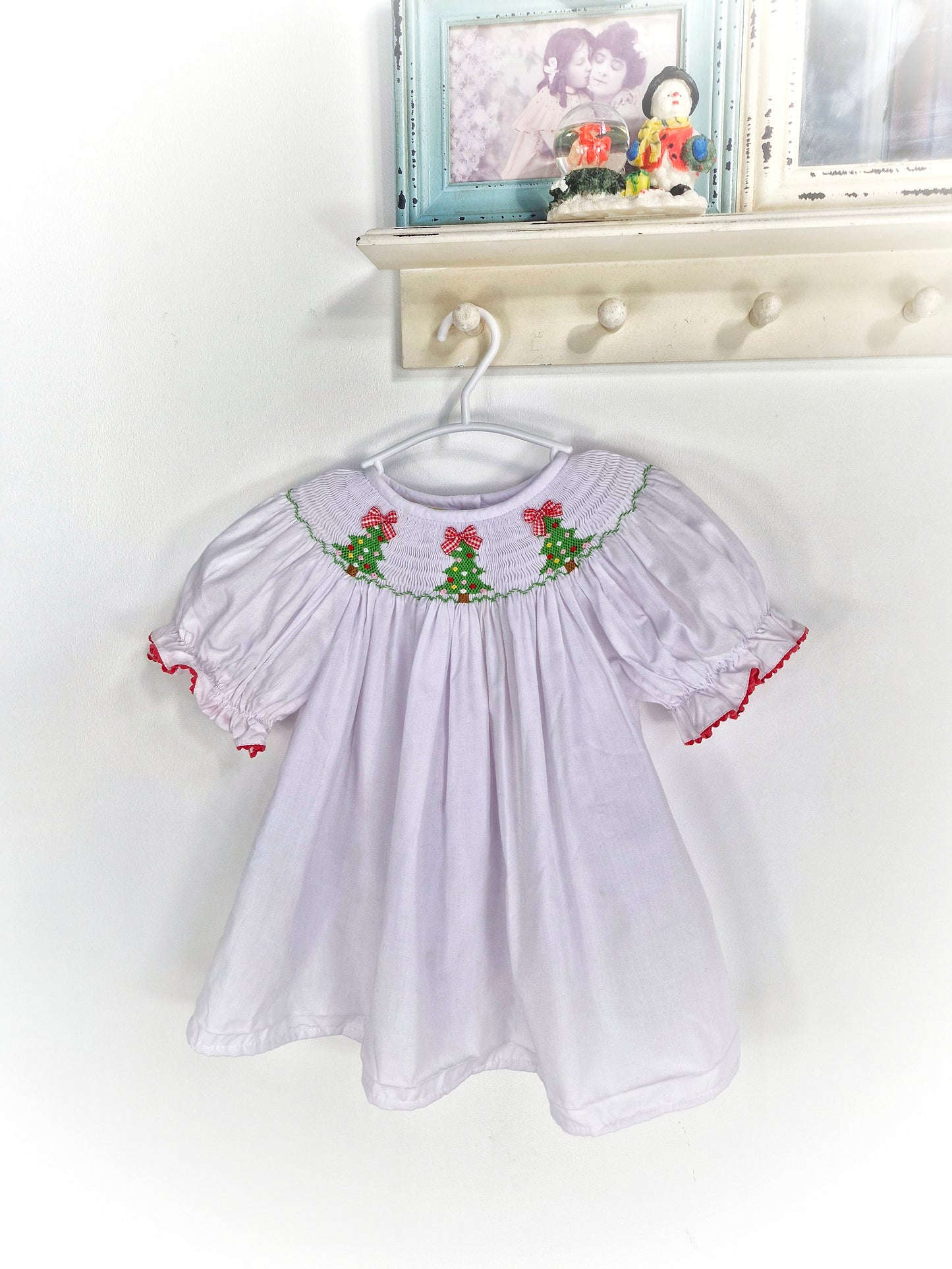 18 months. White smock dress white embroidered Christmas trees and red and white gingham bows