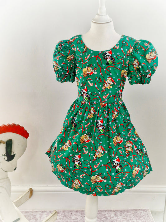 6-7 years. Green handmade vintage festive dress with puffed sleeves and christmas animal print