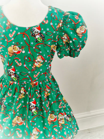 6-7 years. Green handmade vintage festive dress with puffed sleeves and christmas animal print