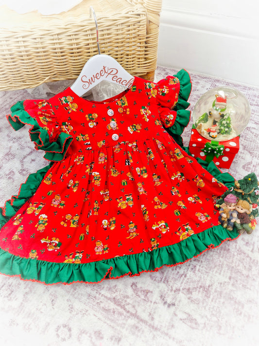9-12 months. Red vintage apron with green frills and flutter sleeves. Christmas teddy bears and "I love you" buttons