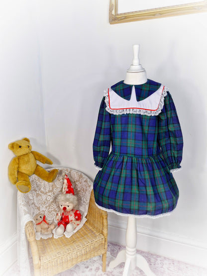 5 years. Navy, green and red tartan vintage dress with white bib by Young St.