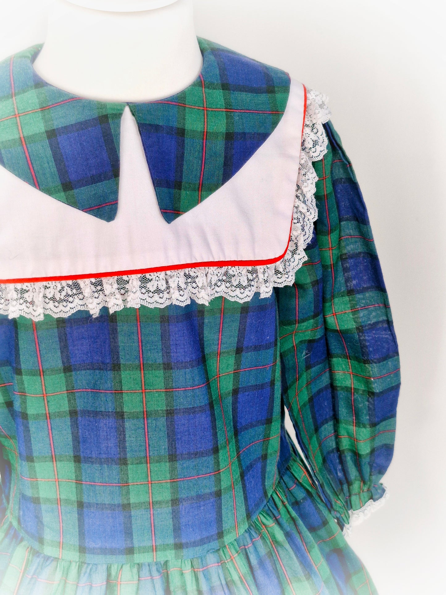 5 years. Navy, green and red tartan vintage dress with white bib by Young St.