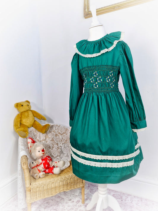 6-7 years. Forest green vintage Polly Flinders smock dress with white embroidered and frill collar