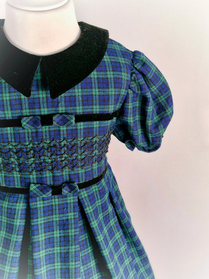 6 years. Bonnie Jean, navy and green tartan dress with black velour collar and smocking