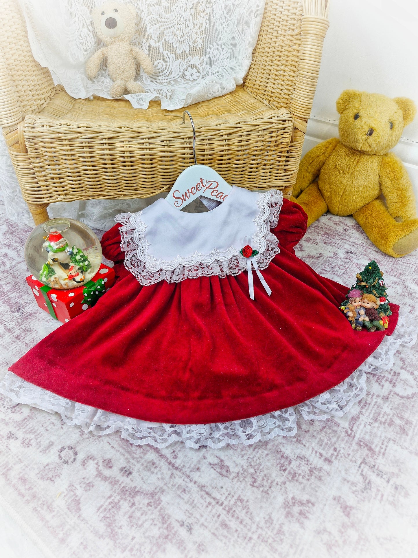 6-9 months. Red velour vintage Bryan dress with white frill bib and red rosette