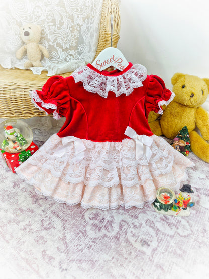 9-12 months. Red velour with white lace collar and frills. Vintage Roanna dress