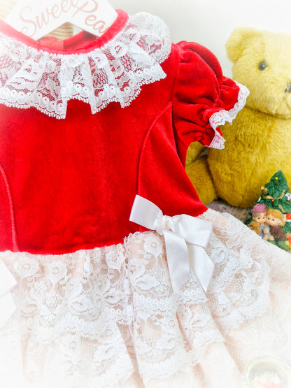 9-12 months. Red velour with white lace collar and frills. Vintage Roanna dress
