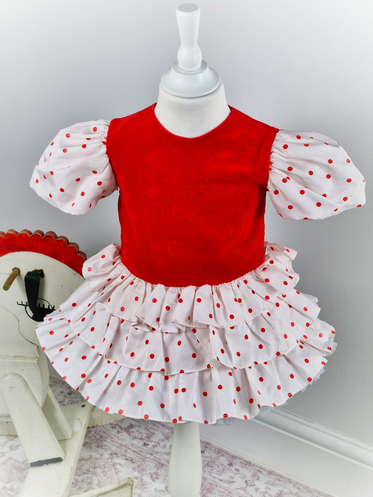 2 years. Vintage Christian Dior. Red velour with white puff sleeves, layered skirt and red polka dots