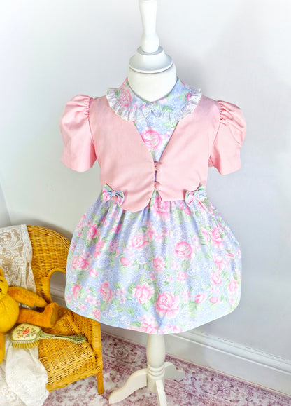 3 years. Two piece vintage set. Floral sleeveless pastel dress with frill collar and matching pink jacket with bows