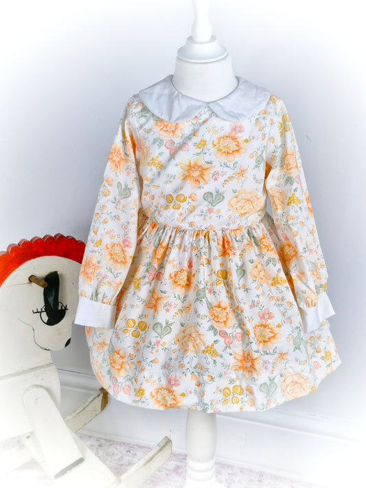 3 years. White Miss Quality dress with orange and peach floral print and Peter Pan collar