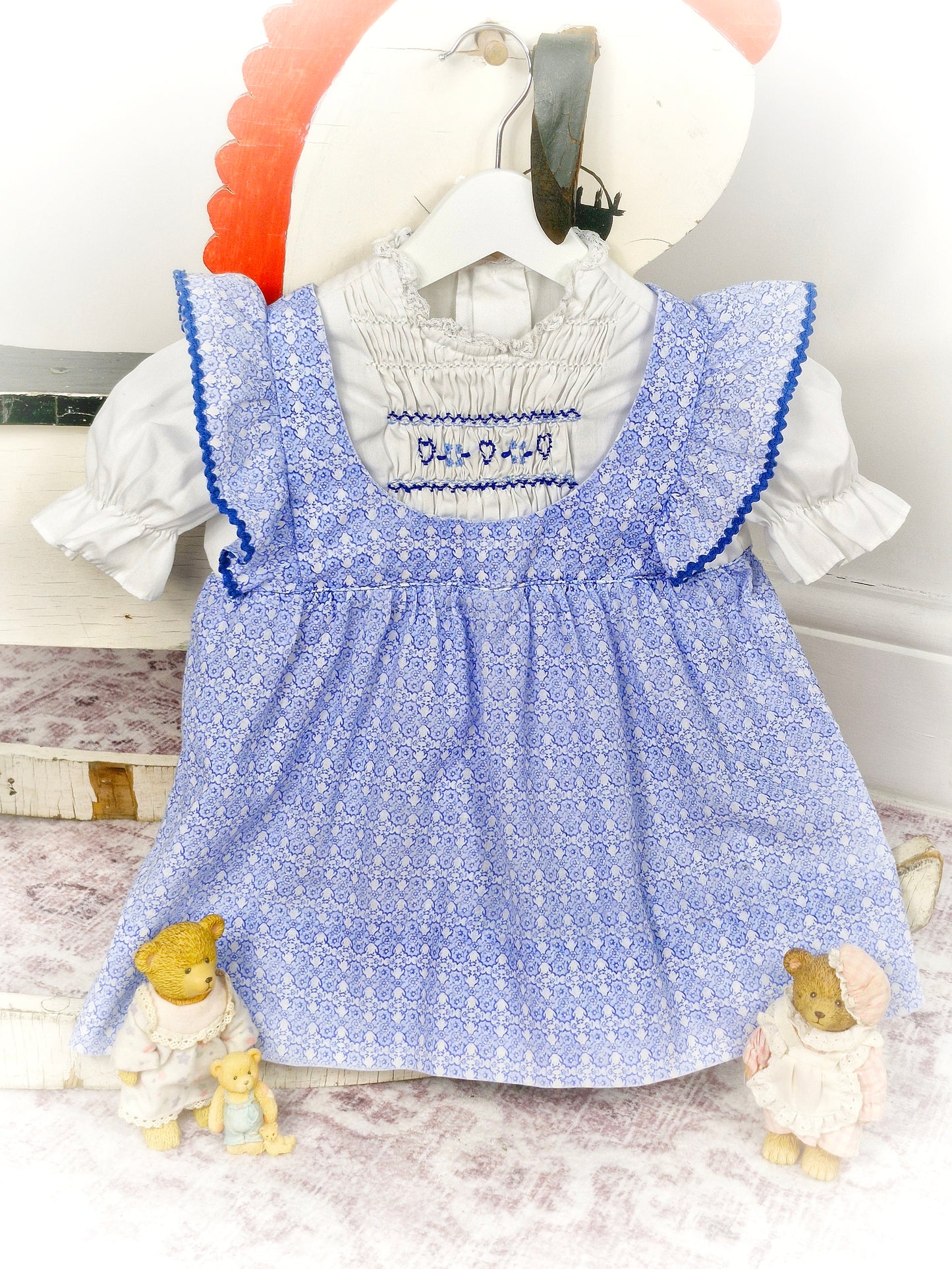 18-24 months. Blue and white vintage smocked dress by Polly Flinders
