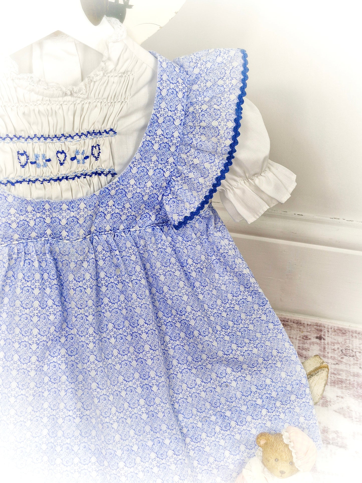 18-24 months. Blue and white vintage smocked dress by Polly Flinders