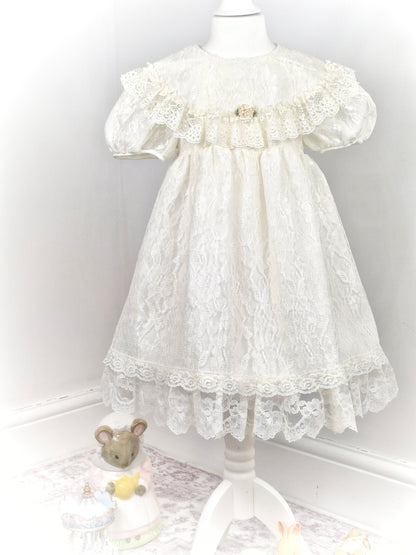 5 years. Cream lace vintage dress with puff sleeves and ruffled bib