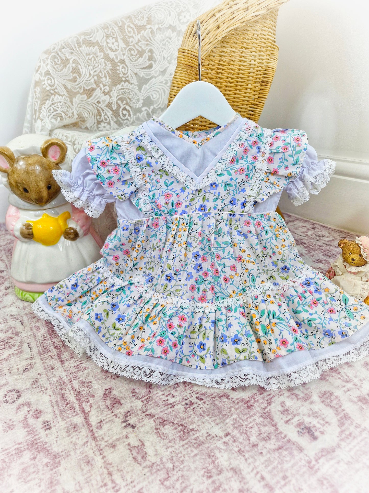 9-12 months. White vintage Babybair dress with flowers, puff sleeves and lace details