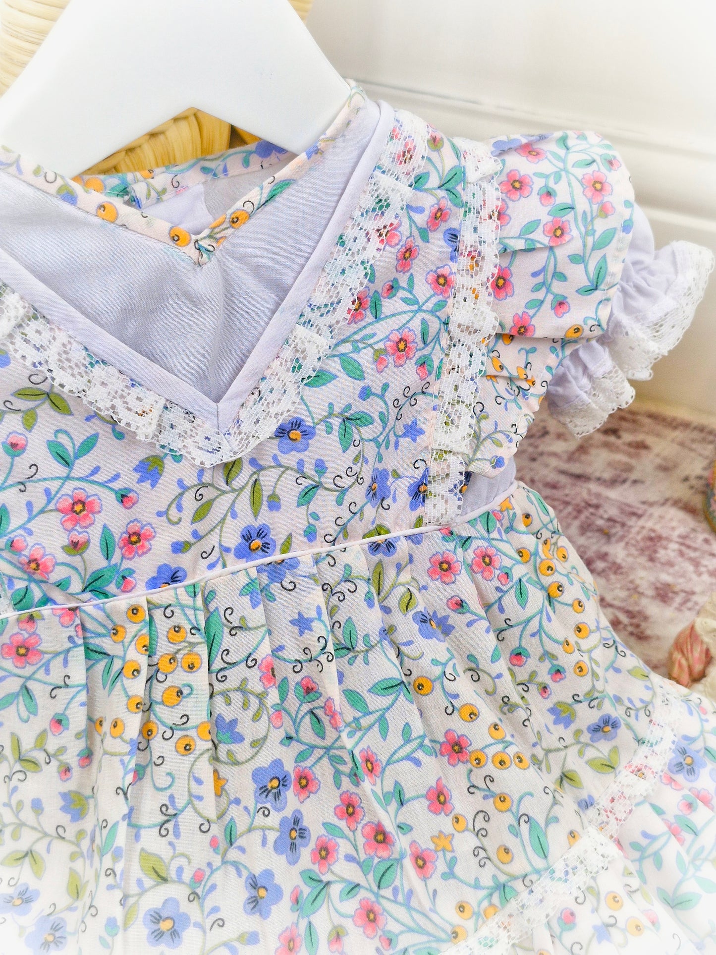 9-12 months. White vintage Babybair dress with flowers, puff sleeves and lace details
