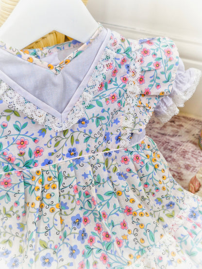 9-12 months. White vintage Babybair dress with flowers, puff sleeves and lace details