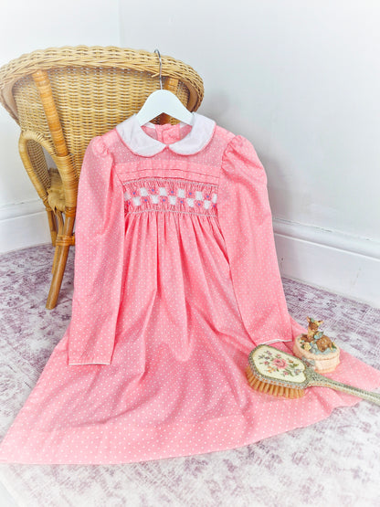 5-6 years. Pink vintage Polly Flinders smock dress with white polka dots and Peter Pan collar