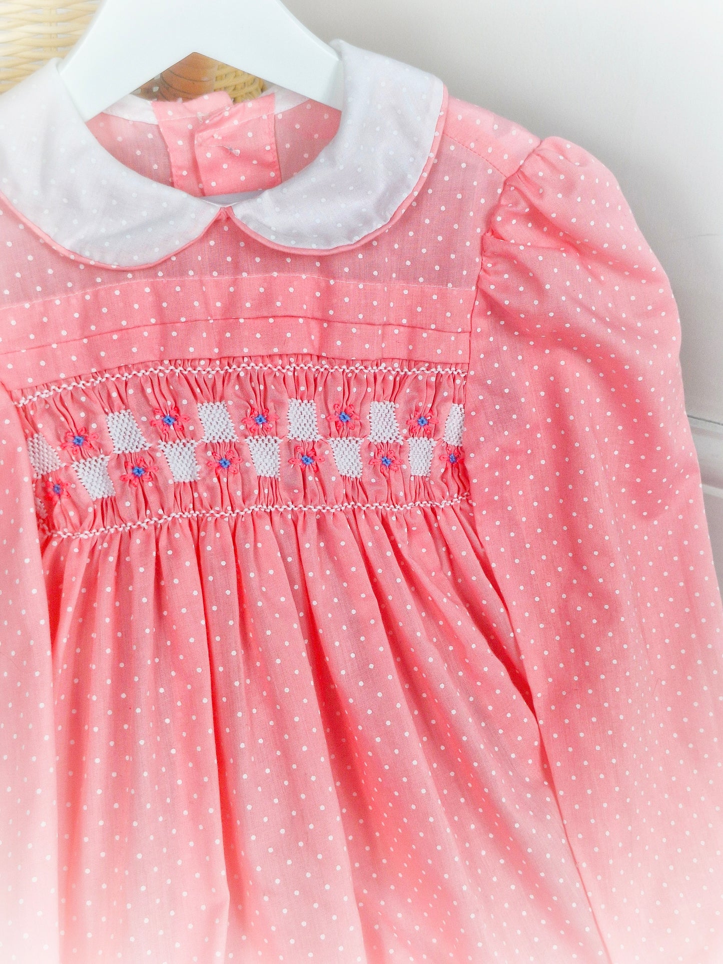 5-6 years. Pink vintage Polly Flinders smock dress with white polka dots and Peter Pan collar