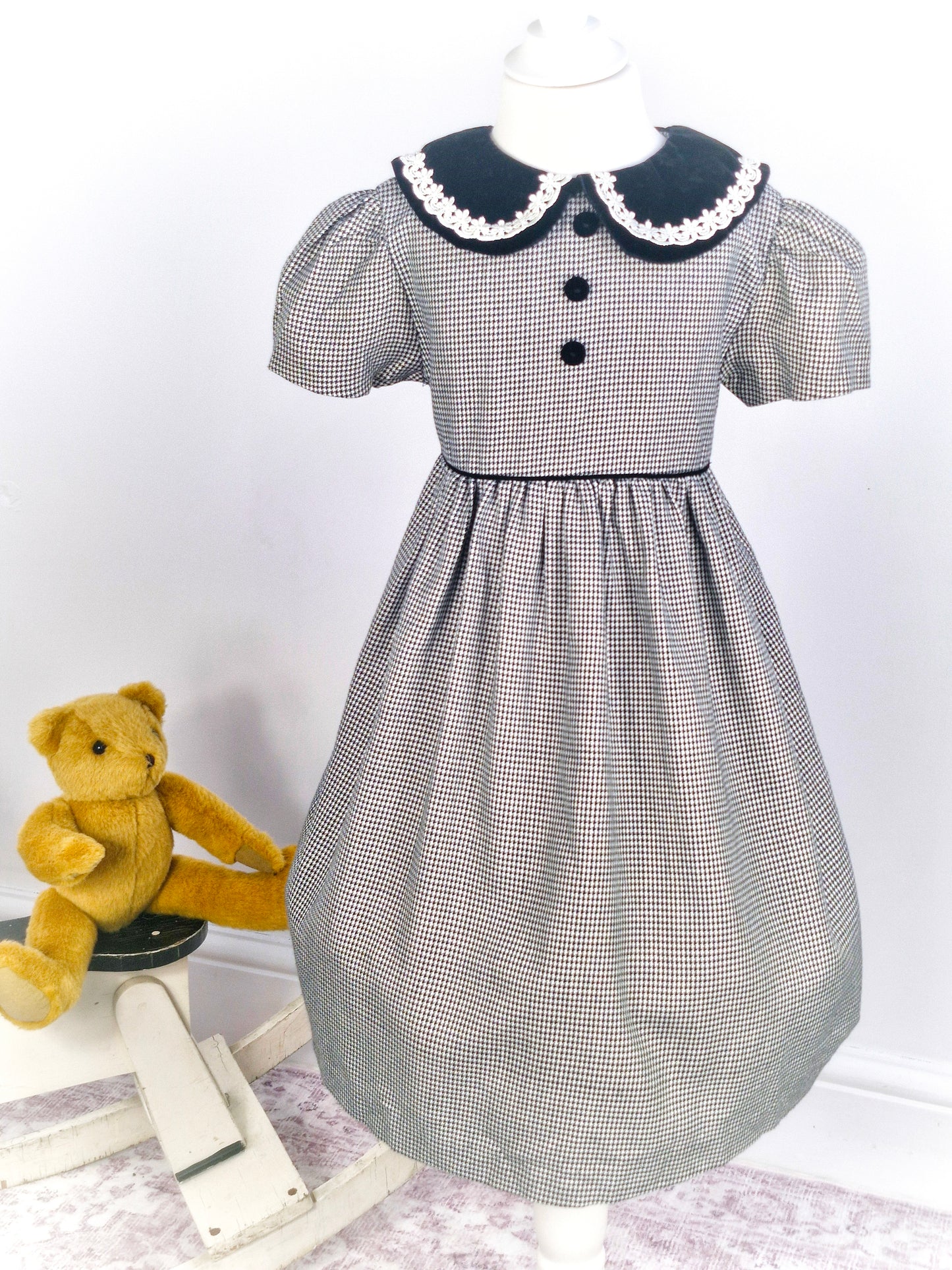 6 years. Black and white gingham dress from Bonnie Baby with black velour collar and buttons