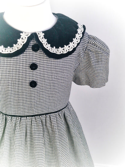 6 years. Black and white gingham dress from Bonnie Baby with black velour collar and buttons