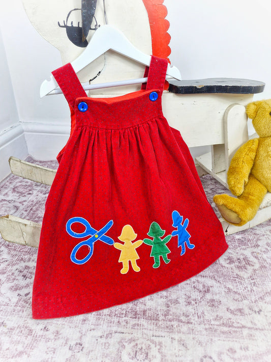 3 years. Red vintage polka dot pinafore dress with paper dolls