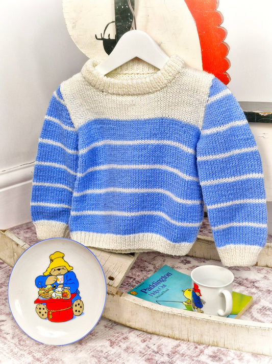 2 years. Blue and white striped knitted jumper