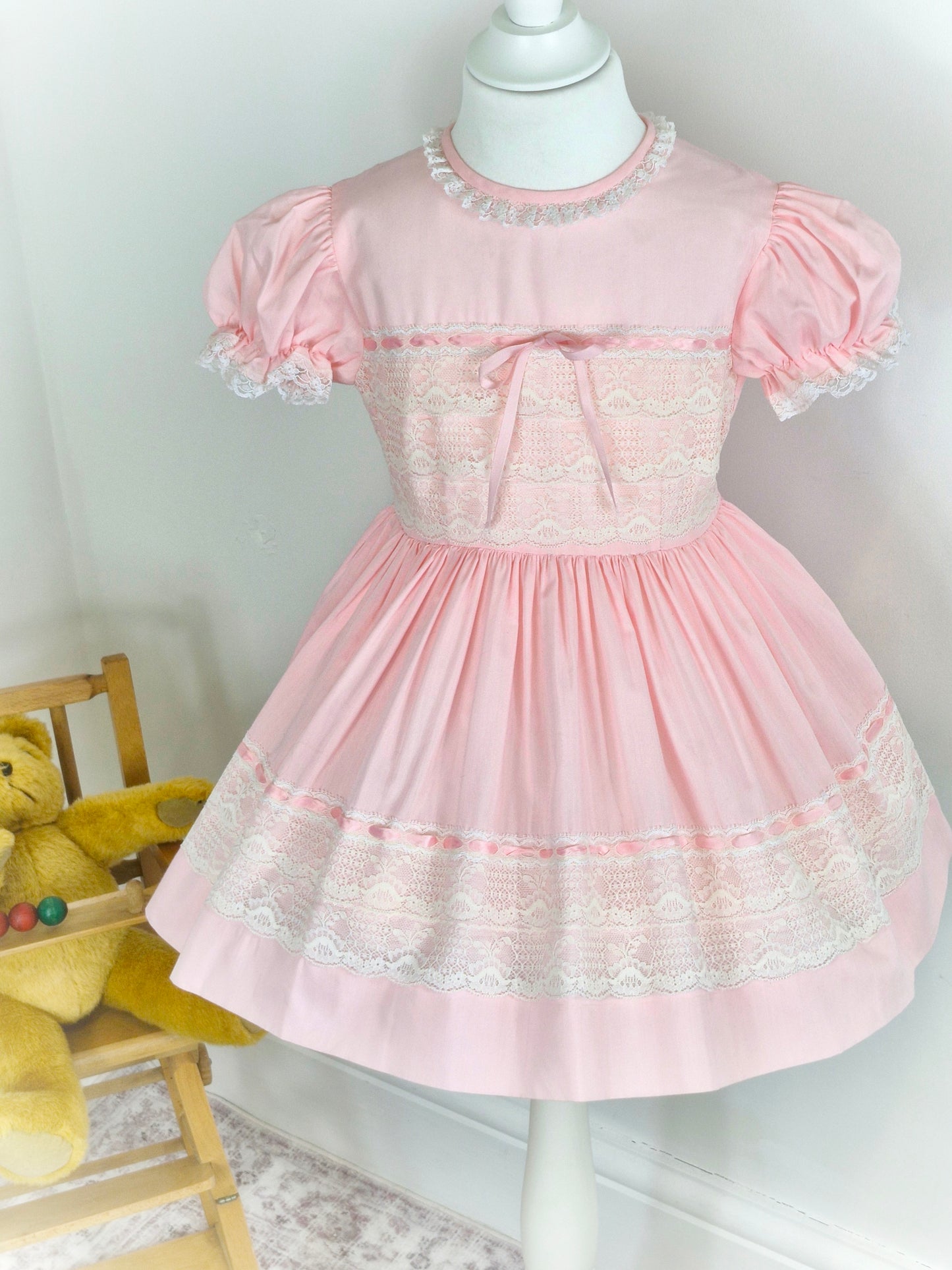4 years. Pink vintage dress with lace and satin ribbon details