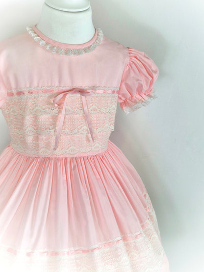 4 years. Pink vintage dress with lace and satin ribbon details