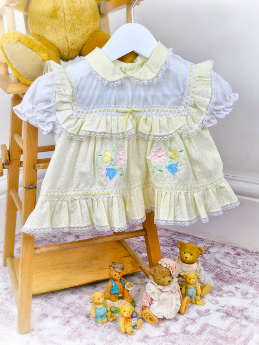 3-6 months. Lemon and white vintage dress by Cradle Togs with lace, flowers and ruffles
