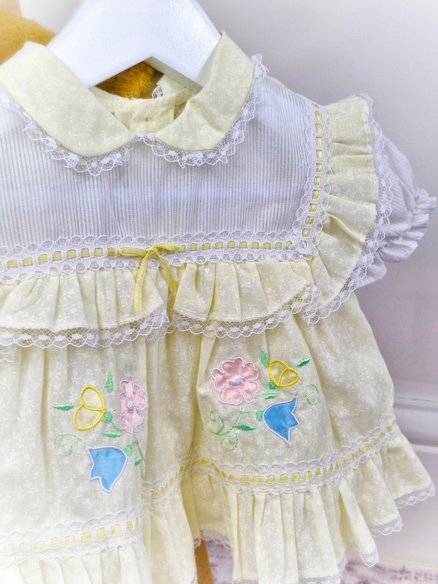 3-6 months. Lemon and white vintage dress by Cradle Togs with lace, flowers and ruffles