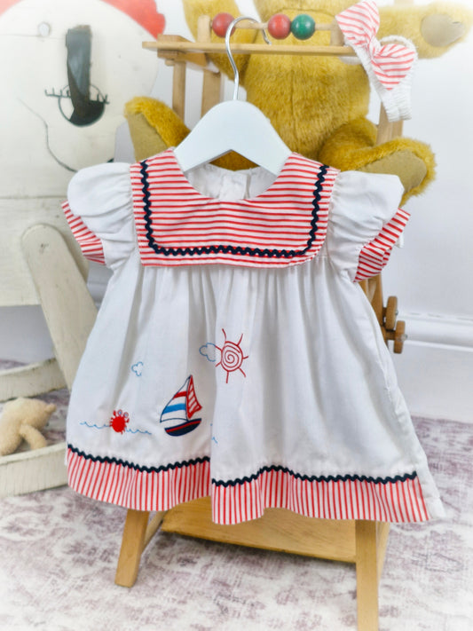 9-12 months. Vintage dress embroidered with boat and matching headband
