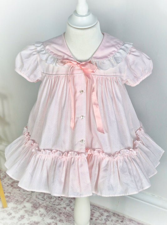 18-24 months. Light pink vintage Bryan with white polka dots and pink satin ribbon