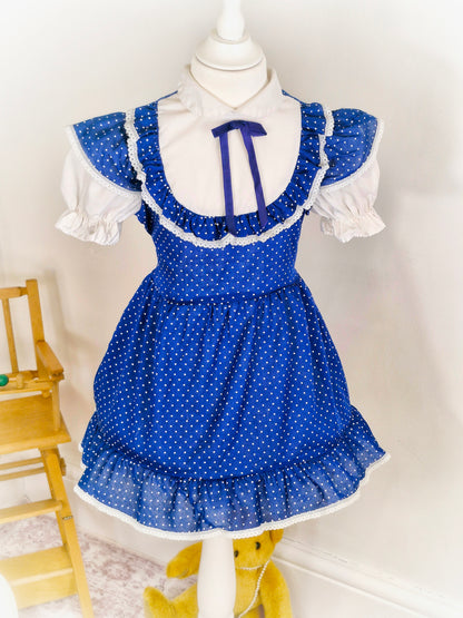 3-4 years. Navy vintage dress with white polka dots, sleeves and chest with ruffles. Winnie the Pooh brand