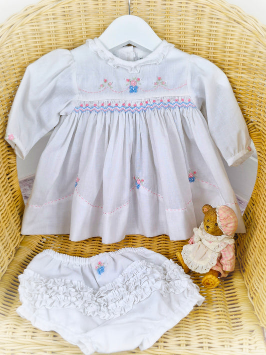 Up to 6 months. White Sarah Louise smock dress and bloomers with delicate embroidered flowers