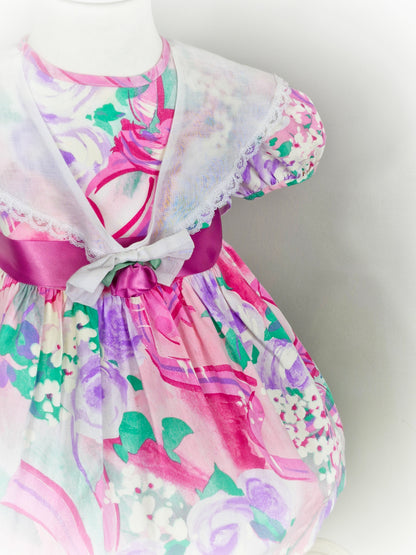 2-3 years. Vintage Roanna dress with vibrant pink print and white lace trimmed collar