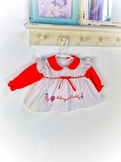0-6 months. Red and white vintage dress with embroidered "my heart belongs to daddy"