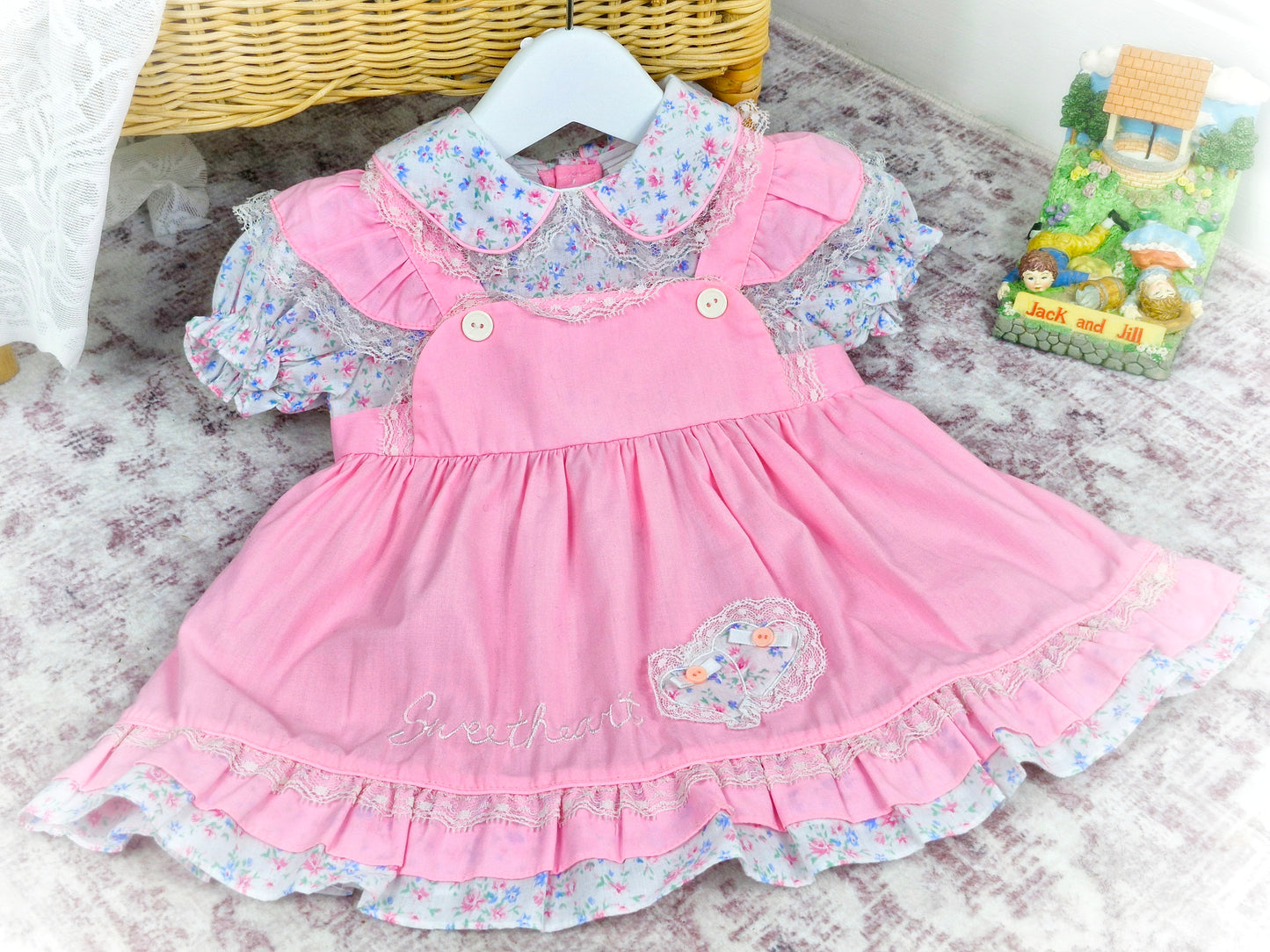 12 months. Pink vintage dress by Mayfair. Floral print, frills and embroidered "sweetheart"