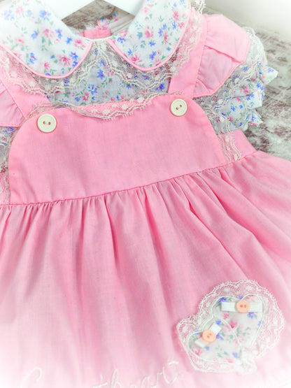 12 months. Pink vintage dress by Mayfair. Floral print, frills and embroidered "sweetheart"