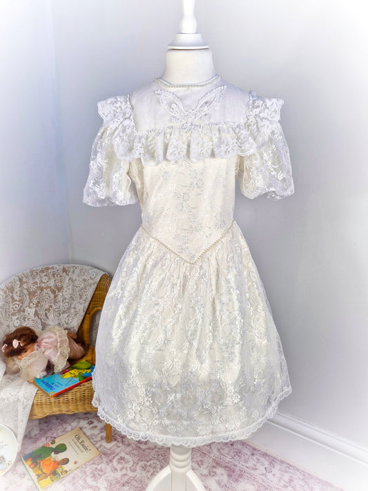 7-8 years. Cottagecore vintage ivory dress with floral lace overlay and large bib