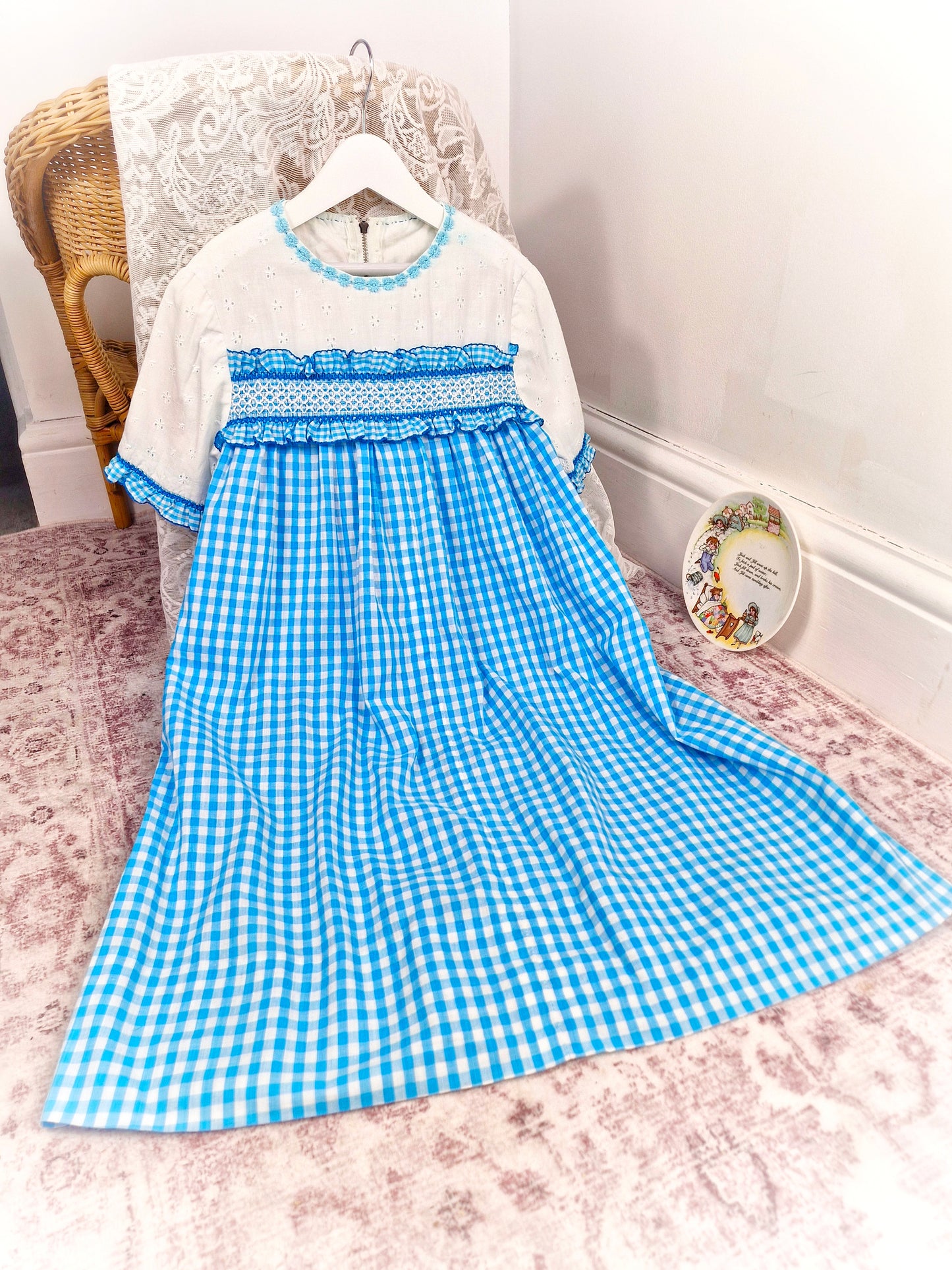 10 years. Blue and white gingham handmade dress with white eyelet cotton, ruffles and hand smocking