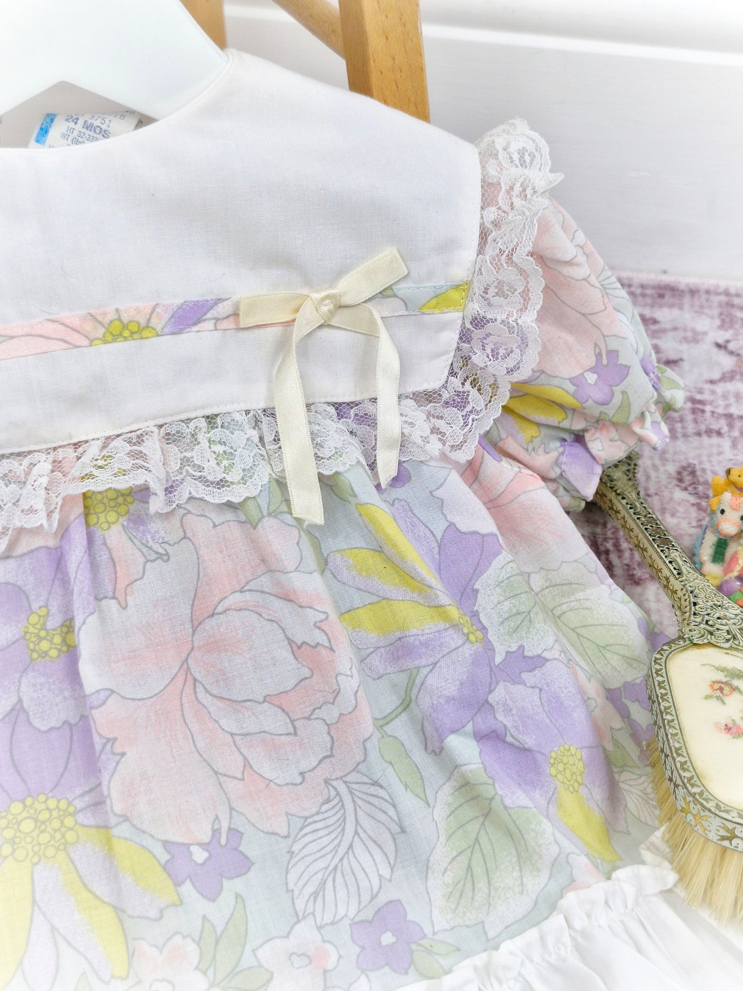 9-12 months. Pastel floral vintage dress with white bib and lace ruffles