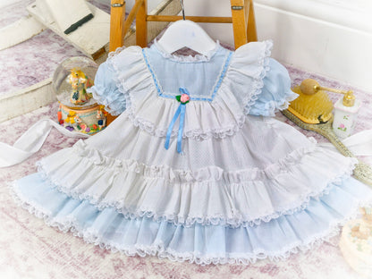 9-12 months. White and blue vintage dress with ruffles, lace and satin ribbon