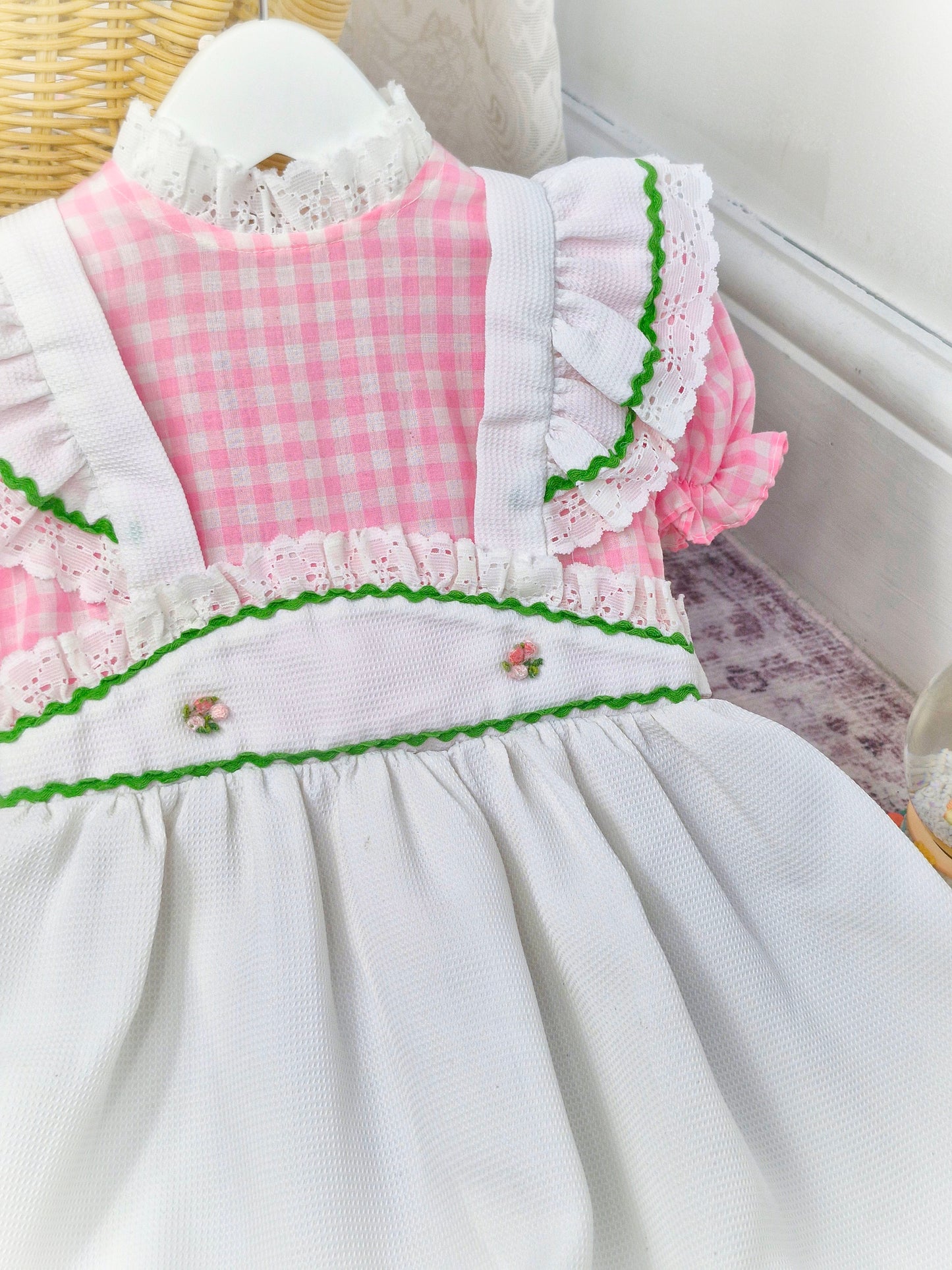 6-7 years. Vintage maxi dress, pink and white gingham with white waffle faux pinny, white lace dress and cross stitch flower designs