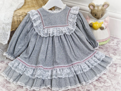 18 months. Grey floral vintage Bryan dress with white lace details and deep red ribbon