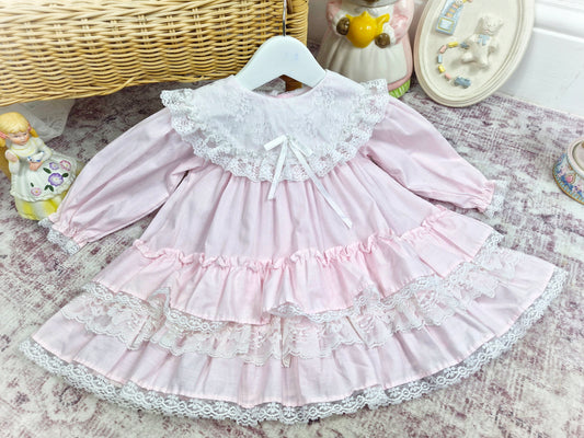 12-18 months. Pink and white Alexis vintage dress with ruffles, lace and ribbon