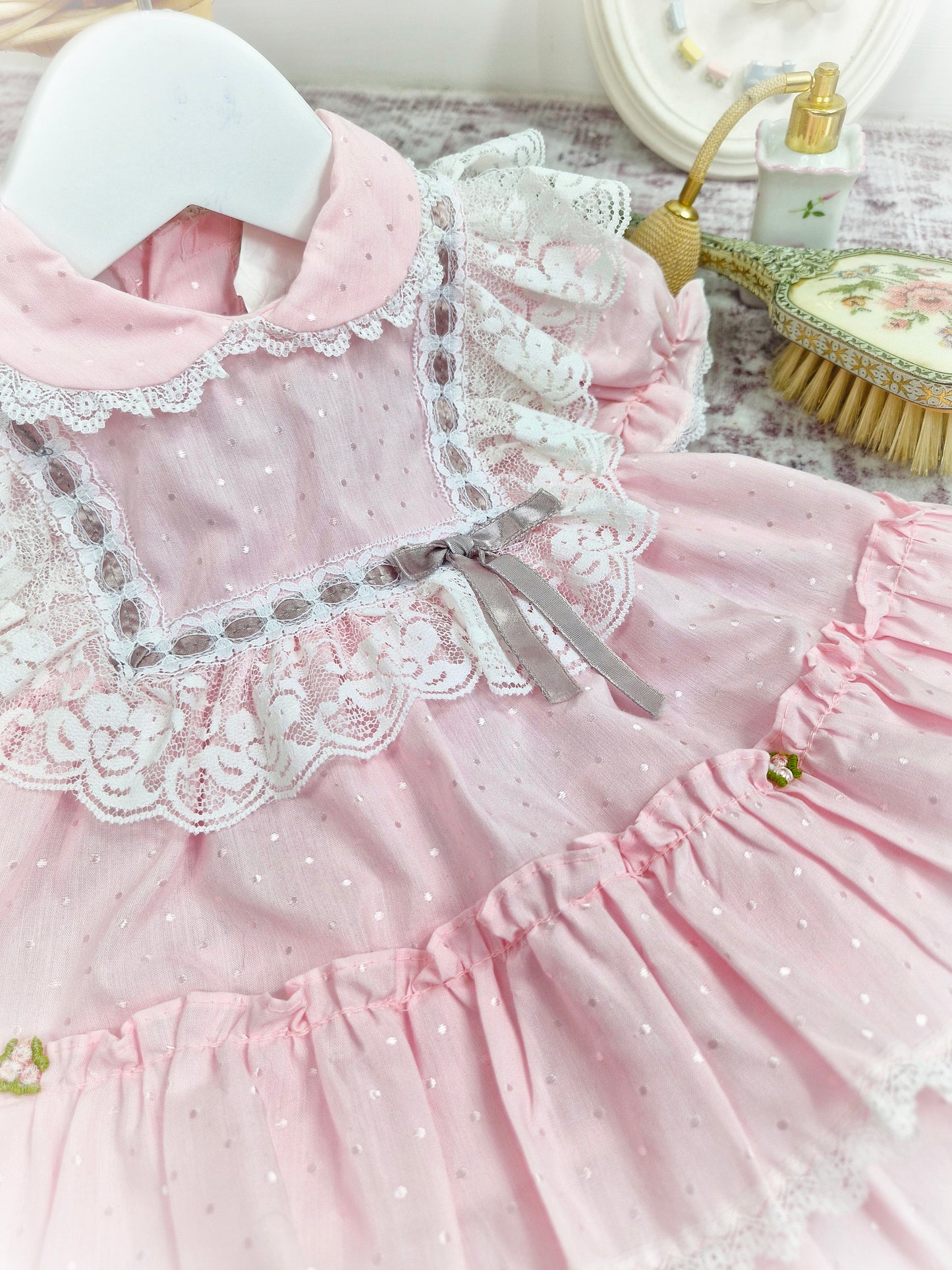 6-9 months. Pink frilly vintage dress with white lace and grey satin ribbon
