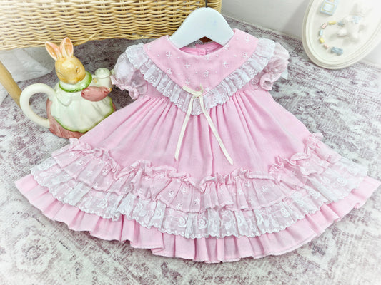 12 months. Pink frilly vintage dress from Hugs & Kisses with ruffles and lace