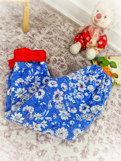 4-5 years. Blue floral vintage trousers with red padded lining