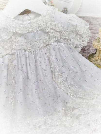 0-6 months. White vintage dress with lace trim and delicate floral print