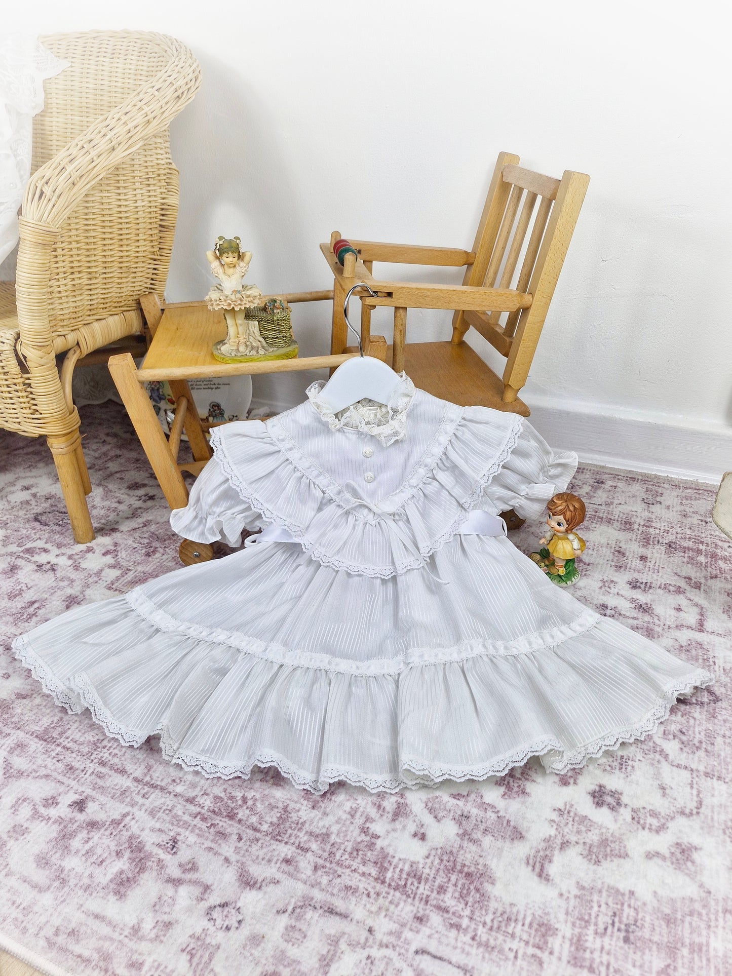 2 years. White vintage dress with lace, ribbon and frills